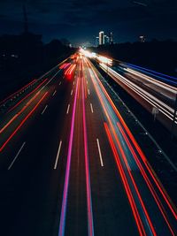 High angle view of light trails on road