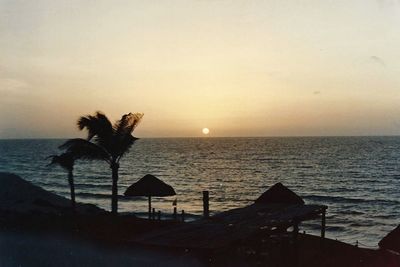 Scenic view of sea against sky at sunset