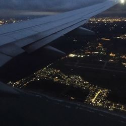 Aerial view of illuminated cityscape at night