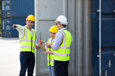 Rear view of men working