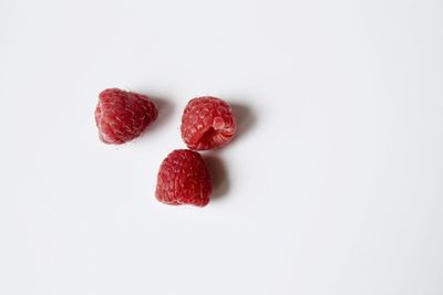 Close-up of strawberry against white background