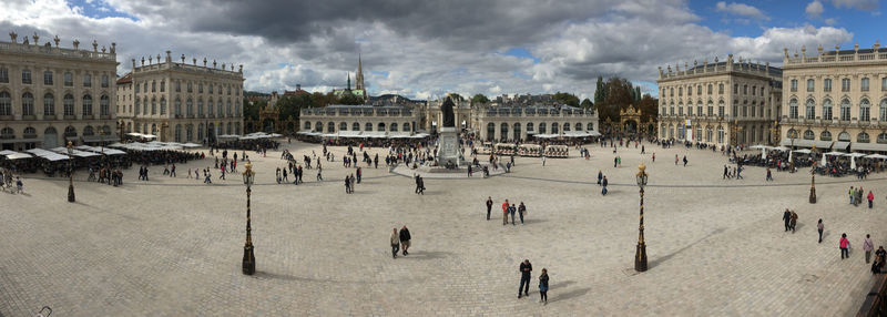 Group of people in town square