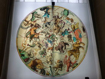 High angle view of stained glass on table