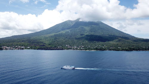 Scenic view of sea against cloudy sky