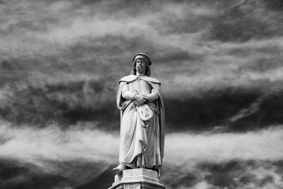 Low angle view of statue against cloudy sky