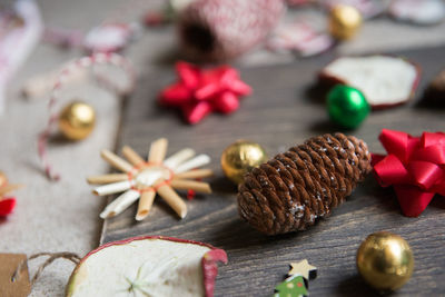 High angle view of christmas decoration and fruit on table