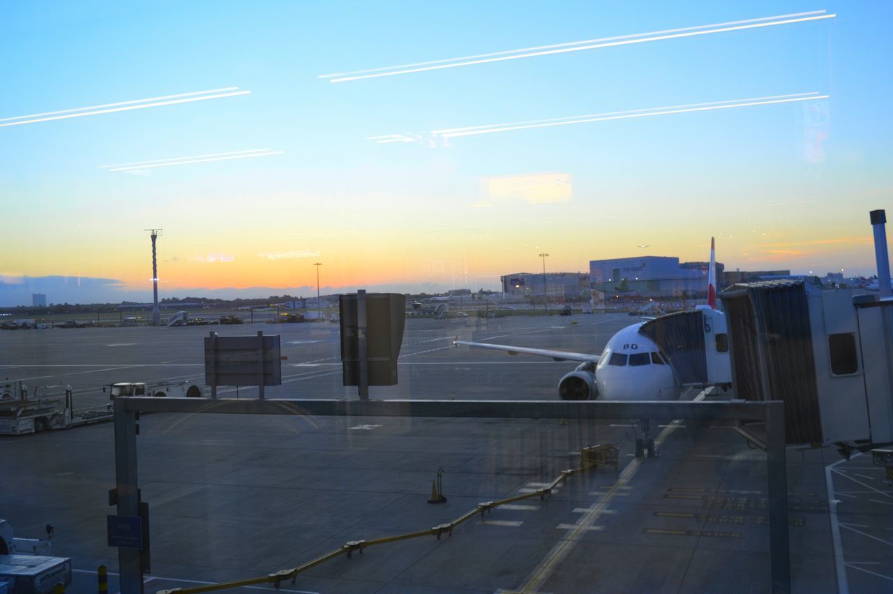 sunset, transportation, airplane, airport, sky, connection, travel, no people, airport runway, built structure, outdoors, commercial airplane, nature, day