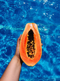 Summer, papaya and pool.