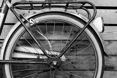 High angle view of bicycle wheel against wall