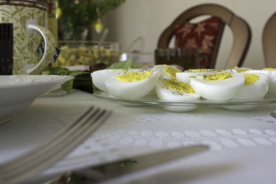 Boiled eggs kept on a dining table during easter festival celebration with family dinner