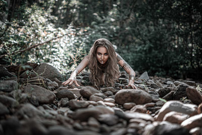 Portrait of a young woman in forest