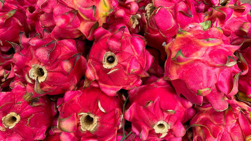 Full frame shot of pink fruits for sale in market