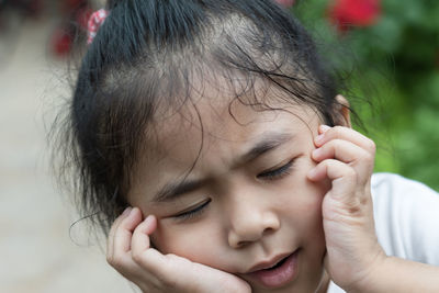 Close-up portrait of cute baby girl