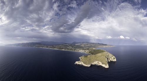 Aerial view of bay against sky