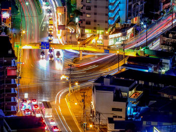 High angle view of light trails on city street