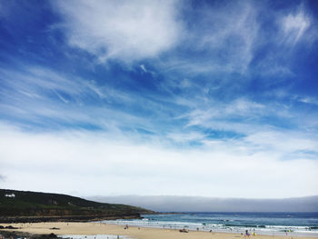 Scenic view of beach against sky