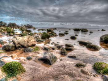 Scenic view of beach against sky