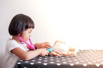 Girl playing with toy