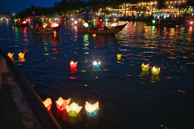 High angle view of people in city at night