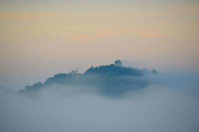 Scenic view of mountain against sky during sunset