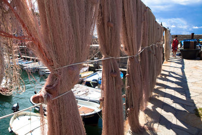 Fishing nets on pier at harbor