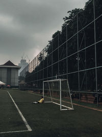 Low angle view of soccer field against sky