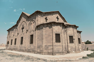 Low angle view of old building against sky