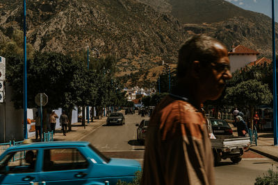 Man walking on street in city