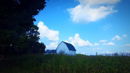 Tent on field against sky