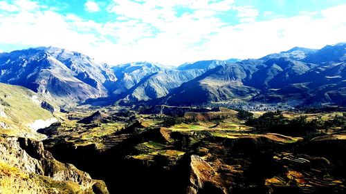Scenic view of snowcapped mountains against sky