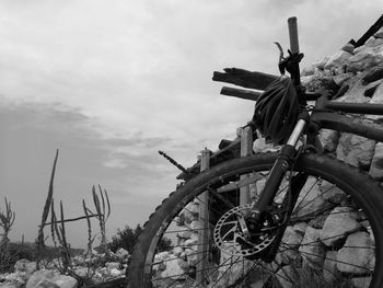 Close-up of bicycle against sky