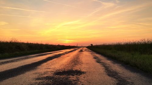 Road passing through field