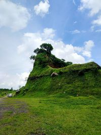 Low angle view of land against sky