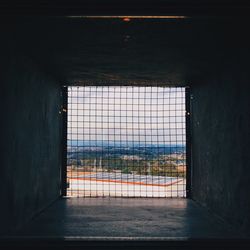 Land seen through window