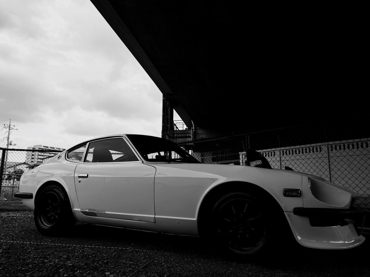 VIEW OF CAR ON ROAD