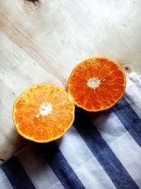 High angle view of orange slices on table