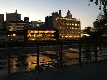 City lit up at dusk