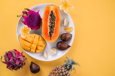 High angle view of fruits in plate on table