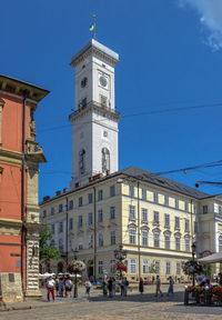 Lviv, ukraine 07.07.2021. town hall on the market square of lviv, ukraine, on a sunny summer day