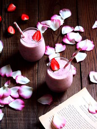 High angle view of pink flowers on table