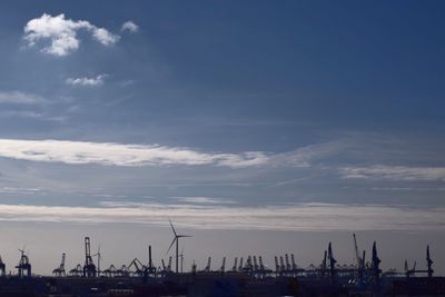 Panoramic view of harbor against sky