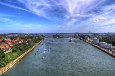 High angle view of river amidst buildings in city