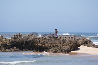 Scenic view of sea against clear sky