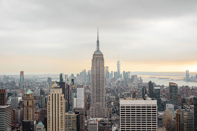 Modern buildings in city against sky