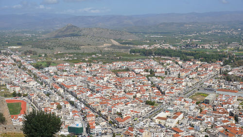 High angle shot of townscape against cityscape