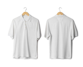 Close-up of clothes hanging against white background