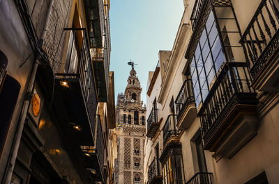 Low angle view of buildings against sky in city