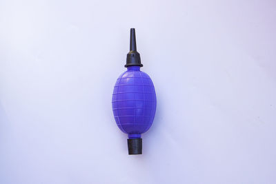 Close-up of electric lamp against white background