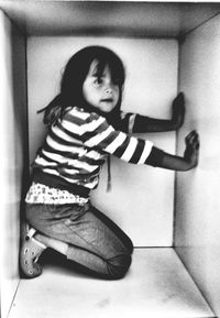 Full length of woman looking at view