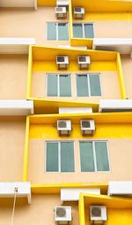 High angle view of yellow windows on building